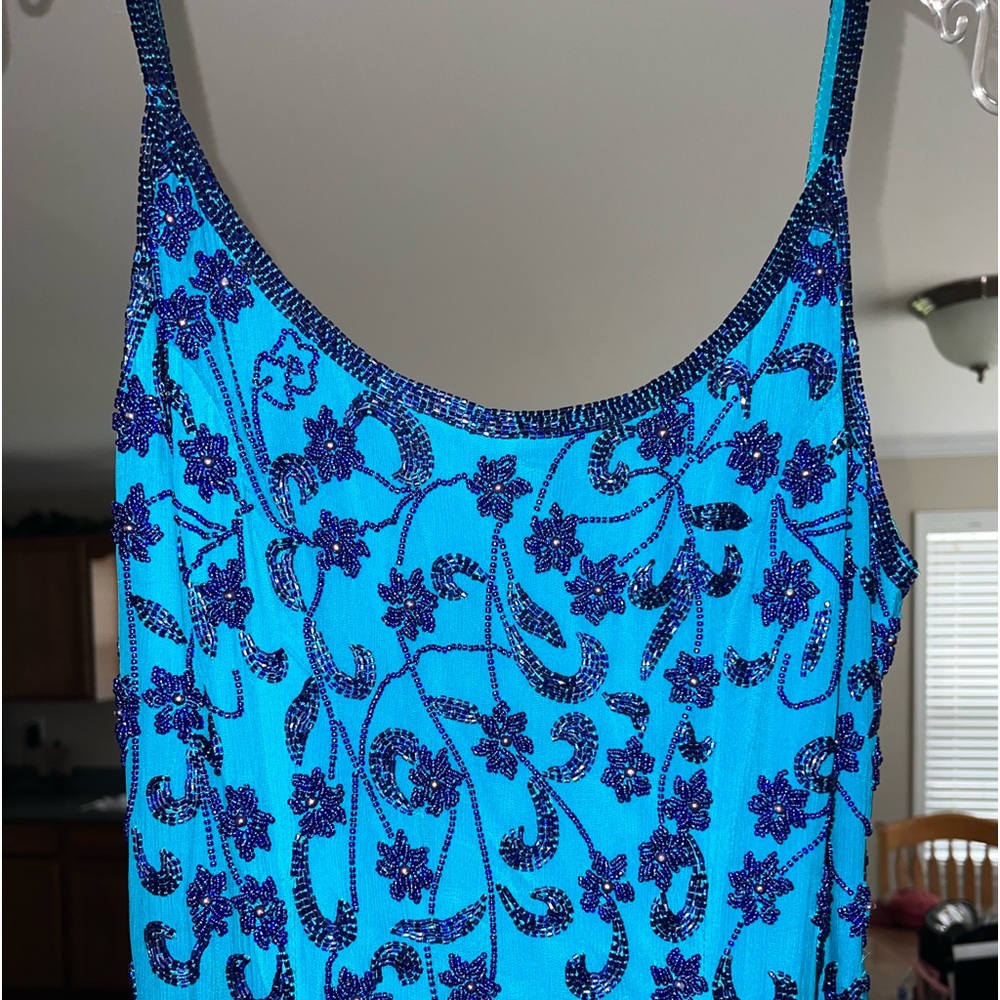Pageant/Prom/Formal dress! A gorgeous blue color with floral beading.